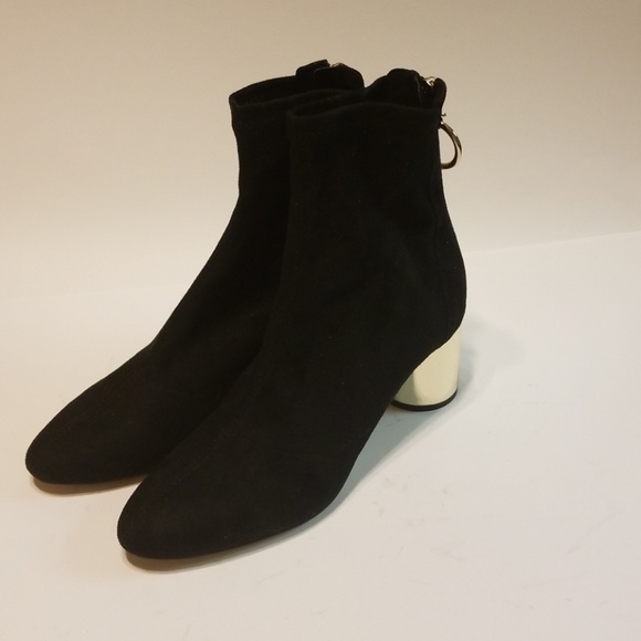 black boots gold heel